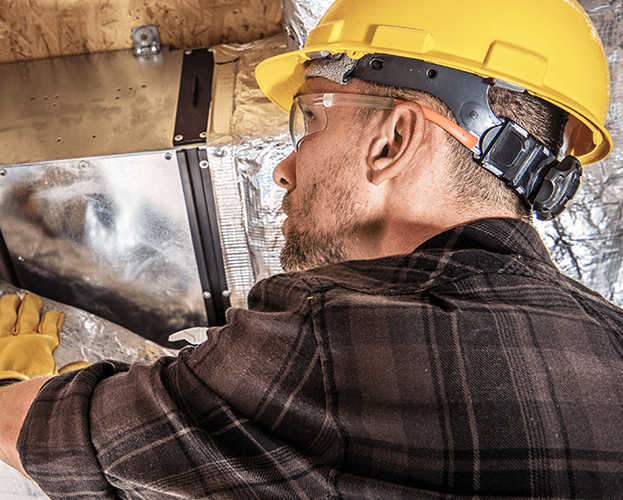Trane technician is installing a furnace.