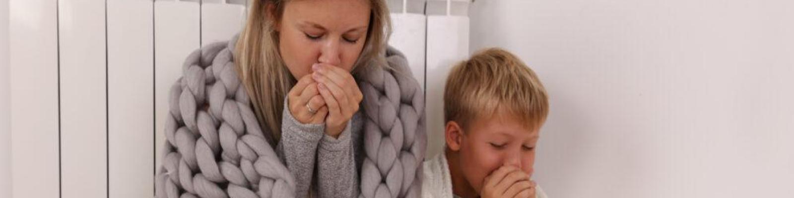 Woman and Child Bundled Against the Cold Inside