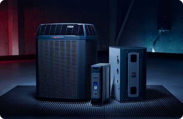 A Trane home unit, thermostat and furnace are on display.