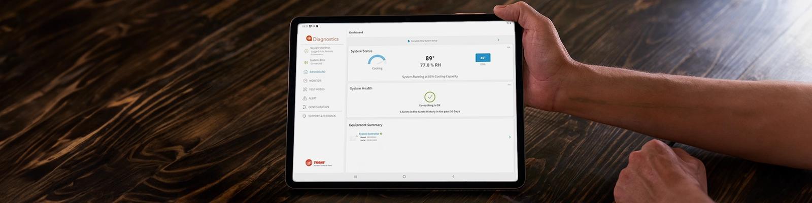Handheld Tablet Displaying Trane HVAC Diagnostics