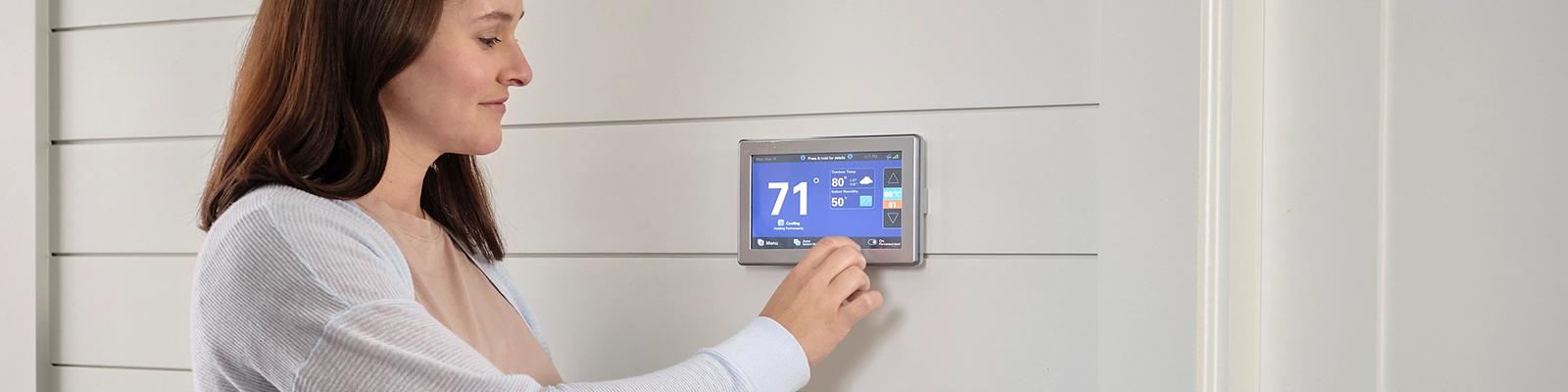 Homeowner with a Trane Smart Thermostat